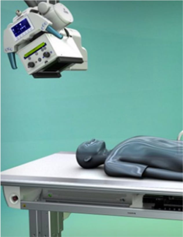 Virtual example of patient on medical table being treated with Fujifilm D-EVO machine