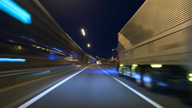 Truck on highway with light painting photography